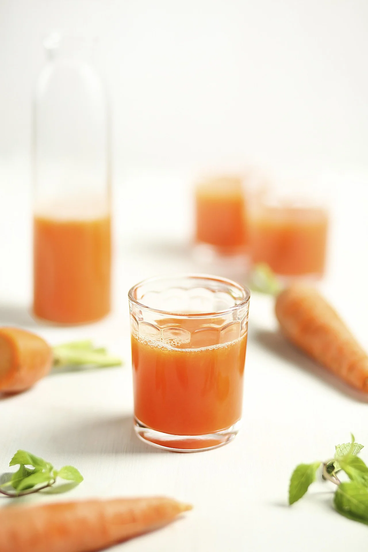 harvesting carrots in pots